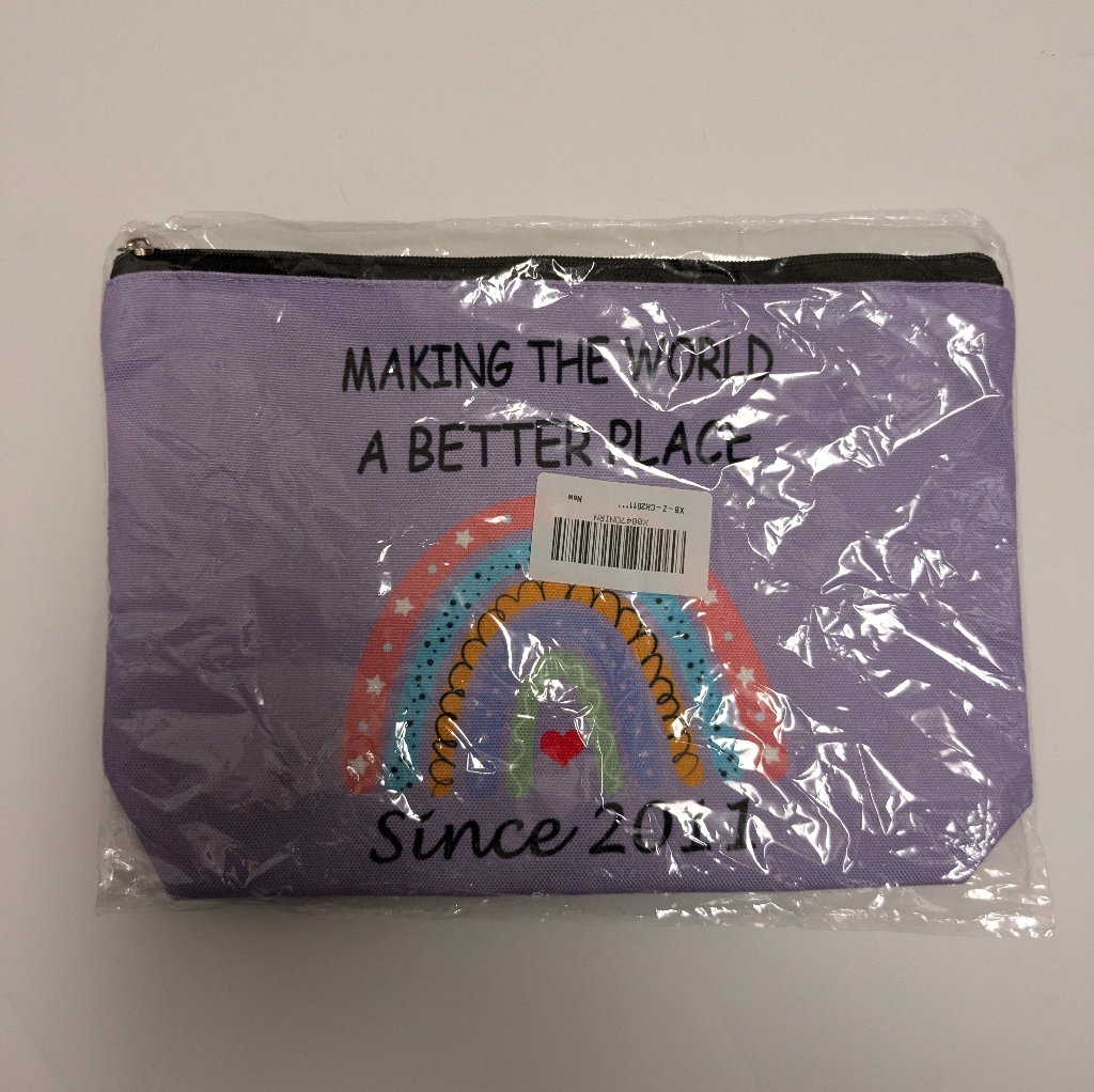 Making The World A Better Place Purple Cosmetic Bag